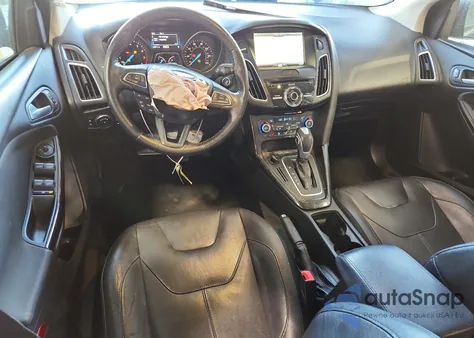 2015 Ford Focus Titanium z USA, uszkodzony, nr VIN 1FADP3J2XFL312144